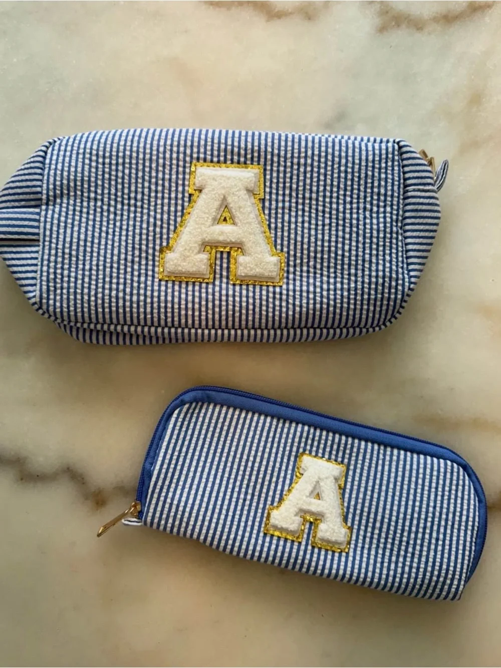 A initial cosmetic pouch set